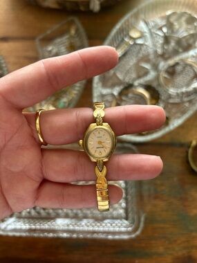 Sharp Vintage Gold-Tone Women's Bracelet Watch with Oval Face